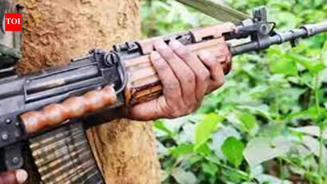 Senior Maoist leader Chelluru Narayana Rao surrenders before Andhra Pradesh Police in Vijayawada. vijayawada news