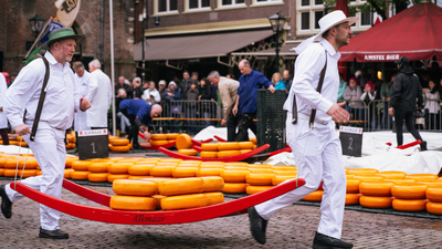 Cheese Ritual: Inside the 660-year-old Dutch market where men dressed in white race with giant cheese wheels world News
