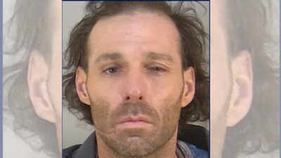 Police say a Florida man killed the dog’s owner while trying to shoot his pet, which was attacking a woman.