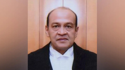 Judge resigns a year after pile of cash was found in his house. india news