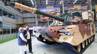 PM Modi inspects indigenous defense systems at Surat facility, gives information about indigenous light tank Zoravar India News